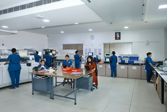 medical Students Testing the equipments at the Laboratory Image at Amala Hospital